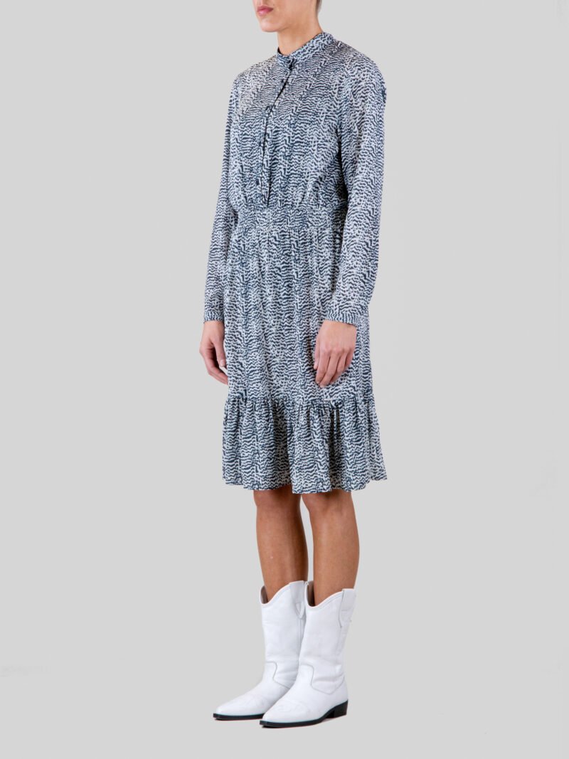 model wearing long printed dress